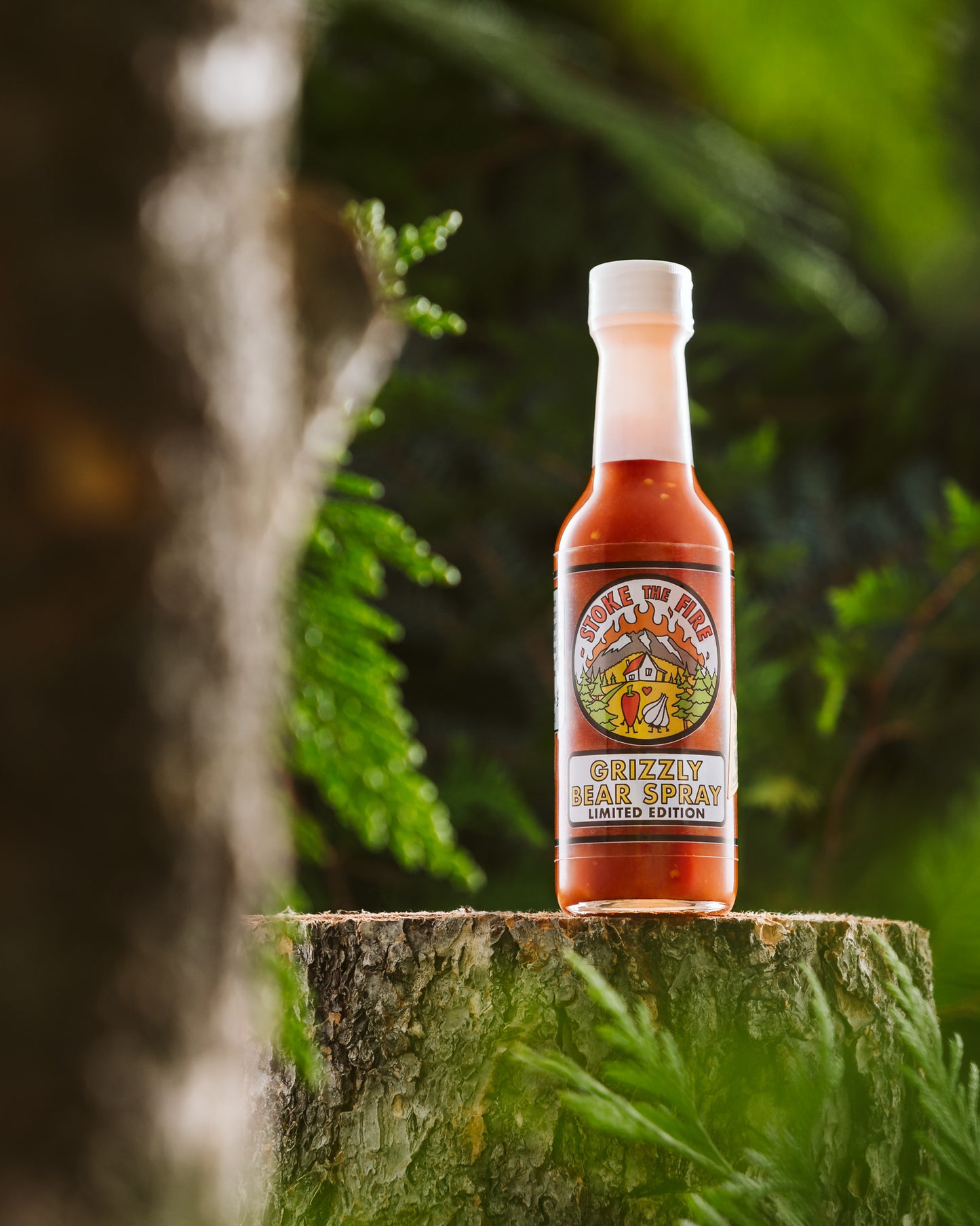 Grizzly Bear Spray extreme hot sauce bottle with warning label and pepper ingredients
